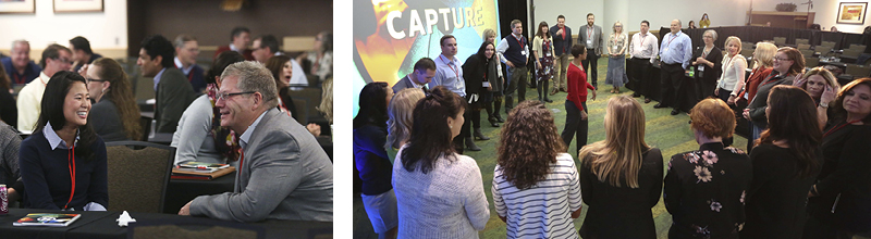 Attendees engaging with one another at event